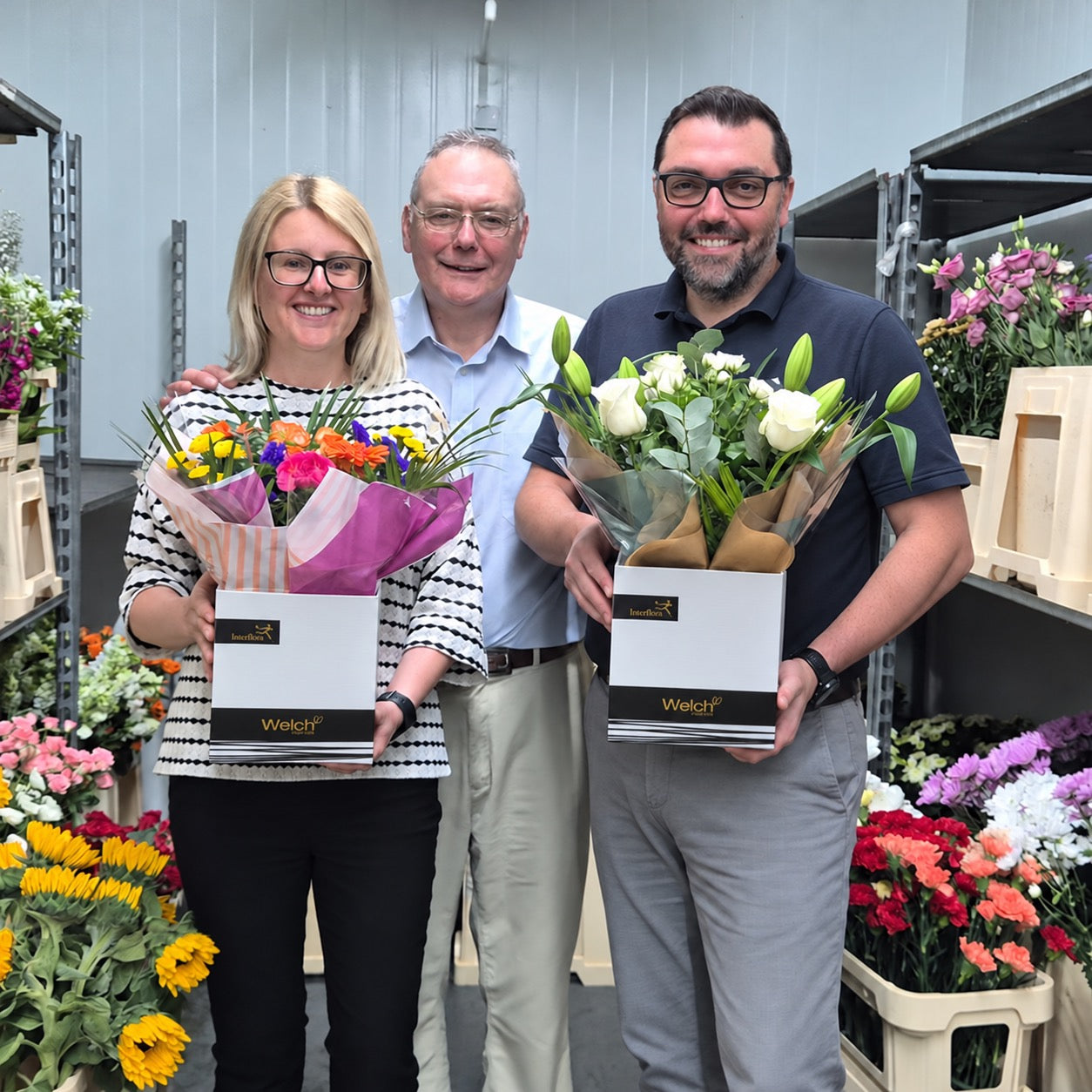 The Welch family celebrating flowers